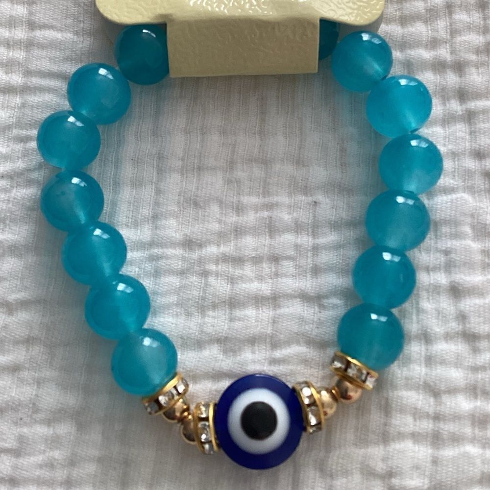 NWT stretch bracelet aqua blue beads, protection